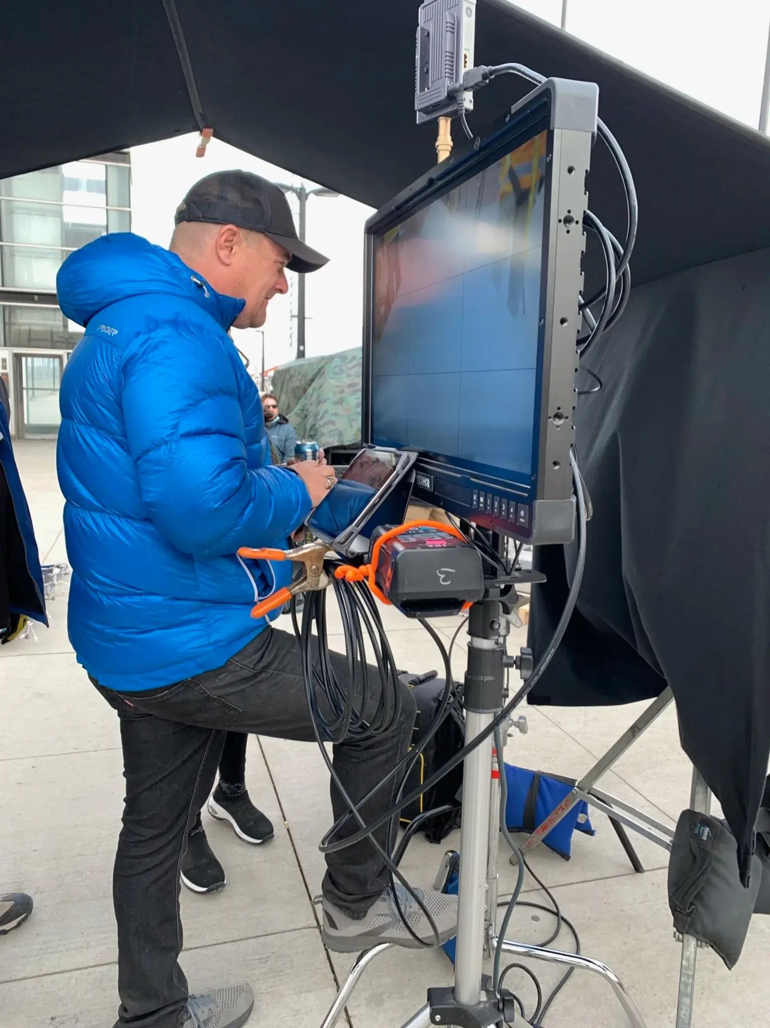 Cinematographer operating RED camera